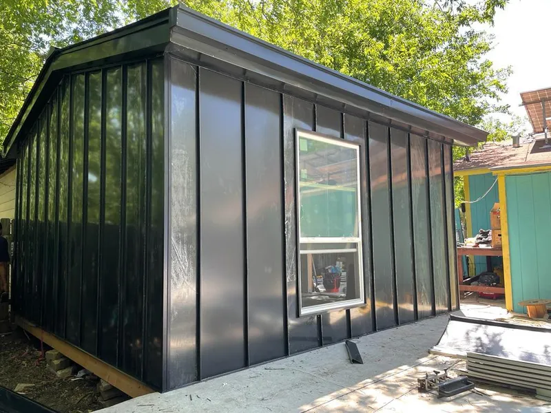 Black standing seam metal wall panels for Roof Inspection in Atlantic